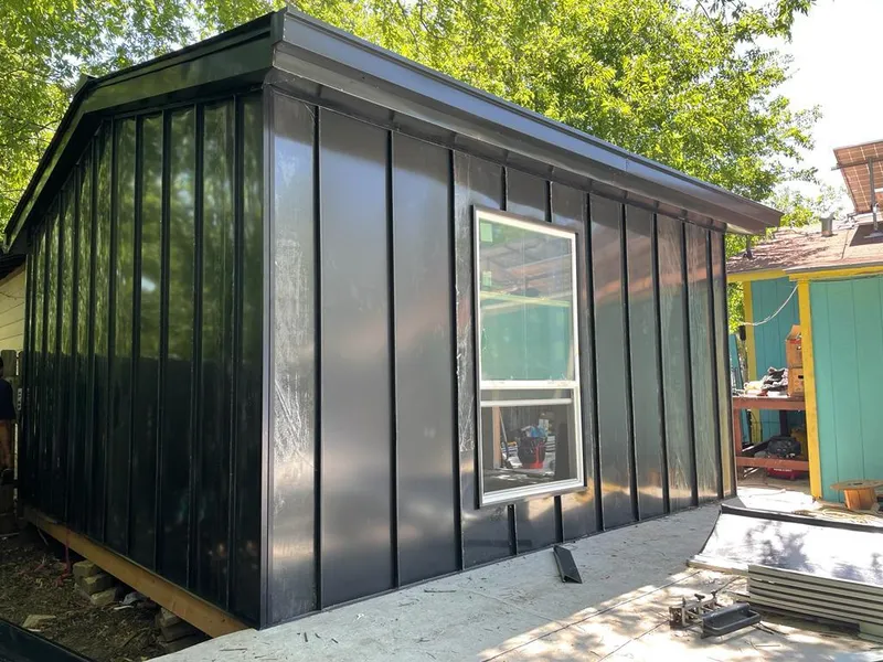 Black standing seam metal wall panels for Roof Inspection in San Martin