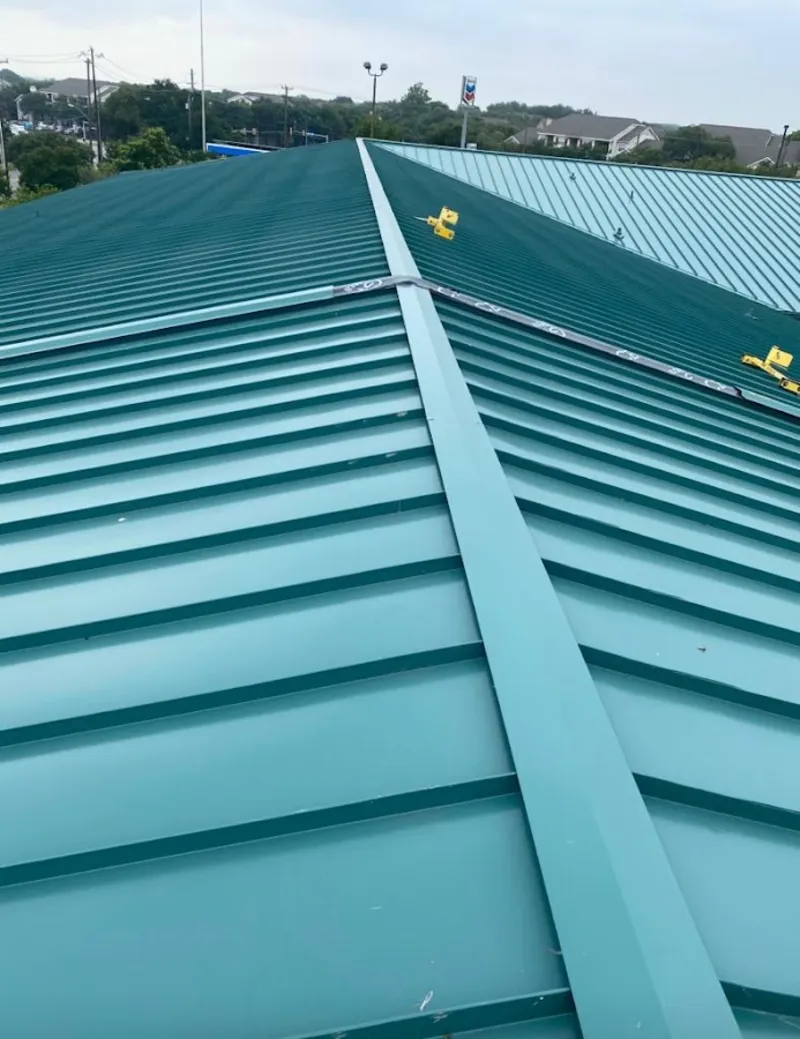 Green commercial metal roof ridge and valley for Metal Roof Repair in San Martin
